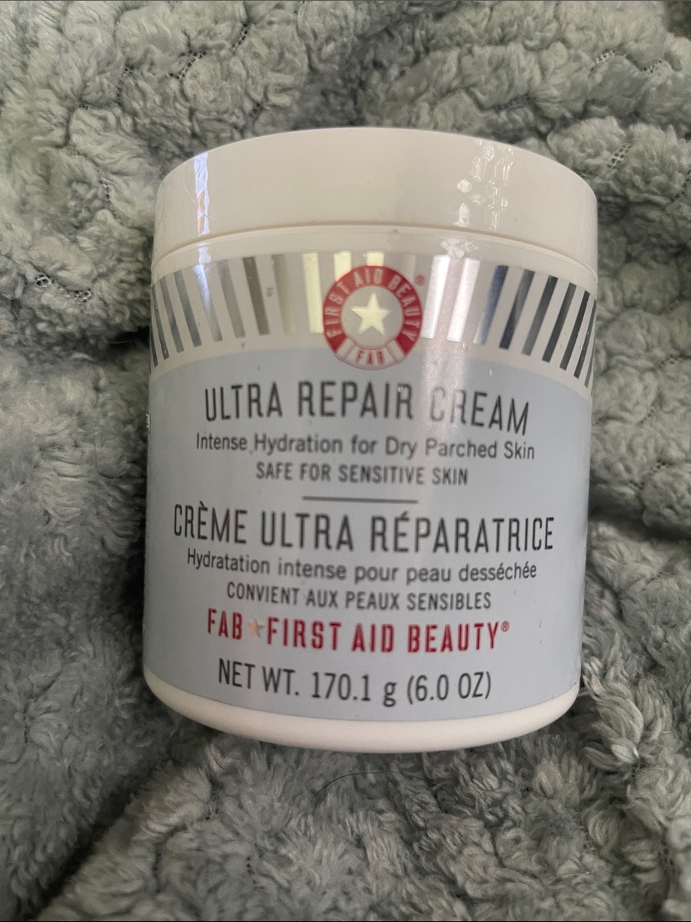 First Aid Beauty Ultra Repair Cream — White jar with Red logo